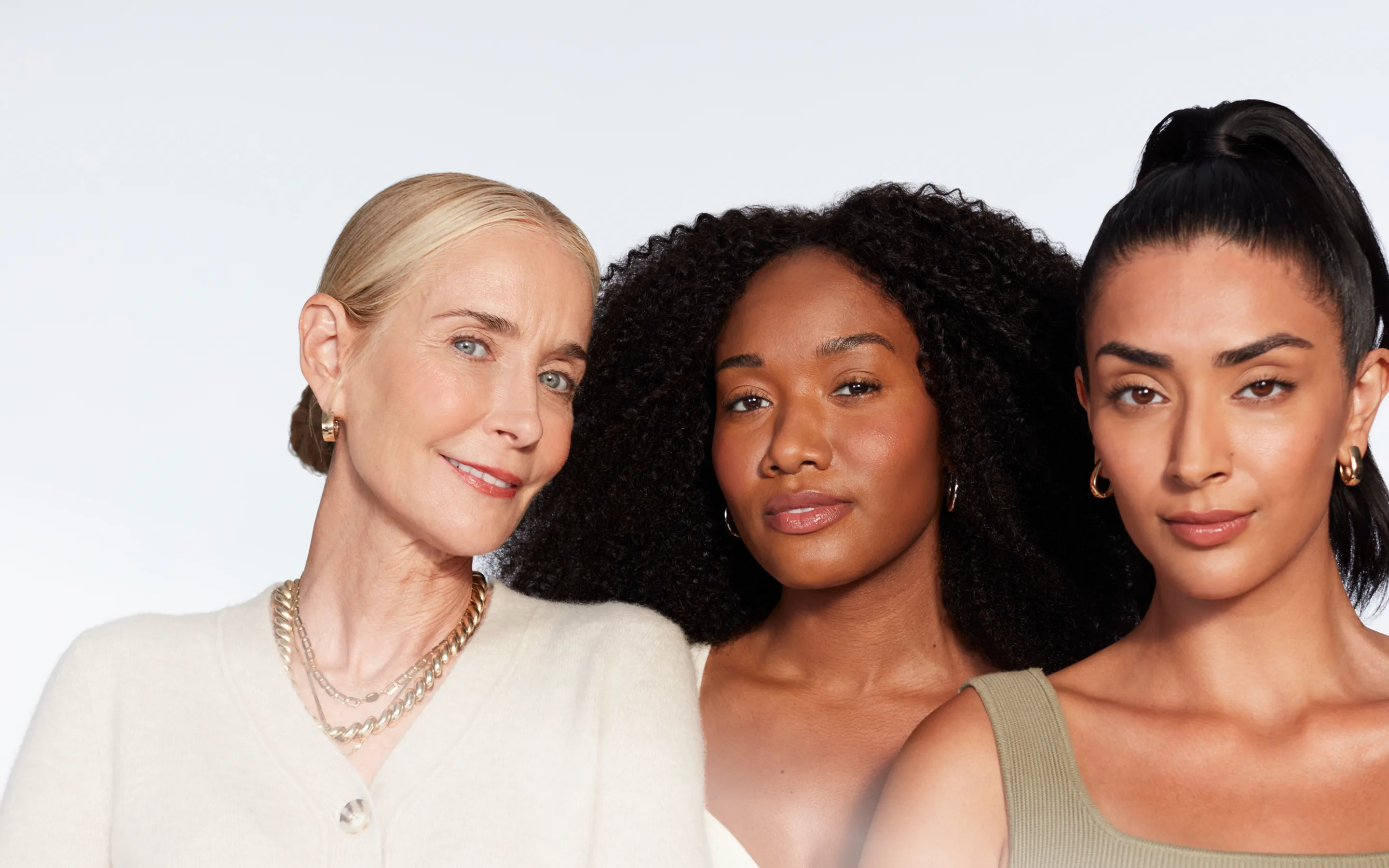 Three women of different ages representing REVIVA's diverse, natural-results clientele